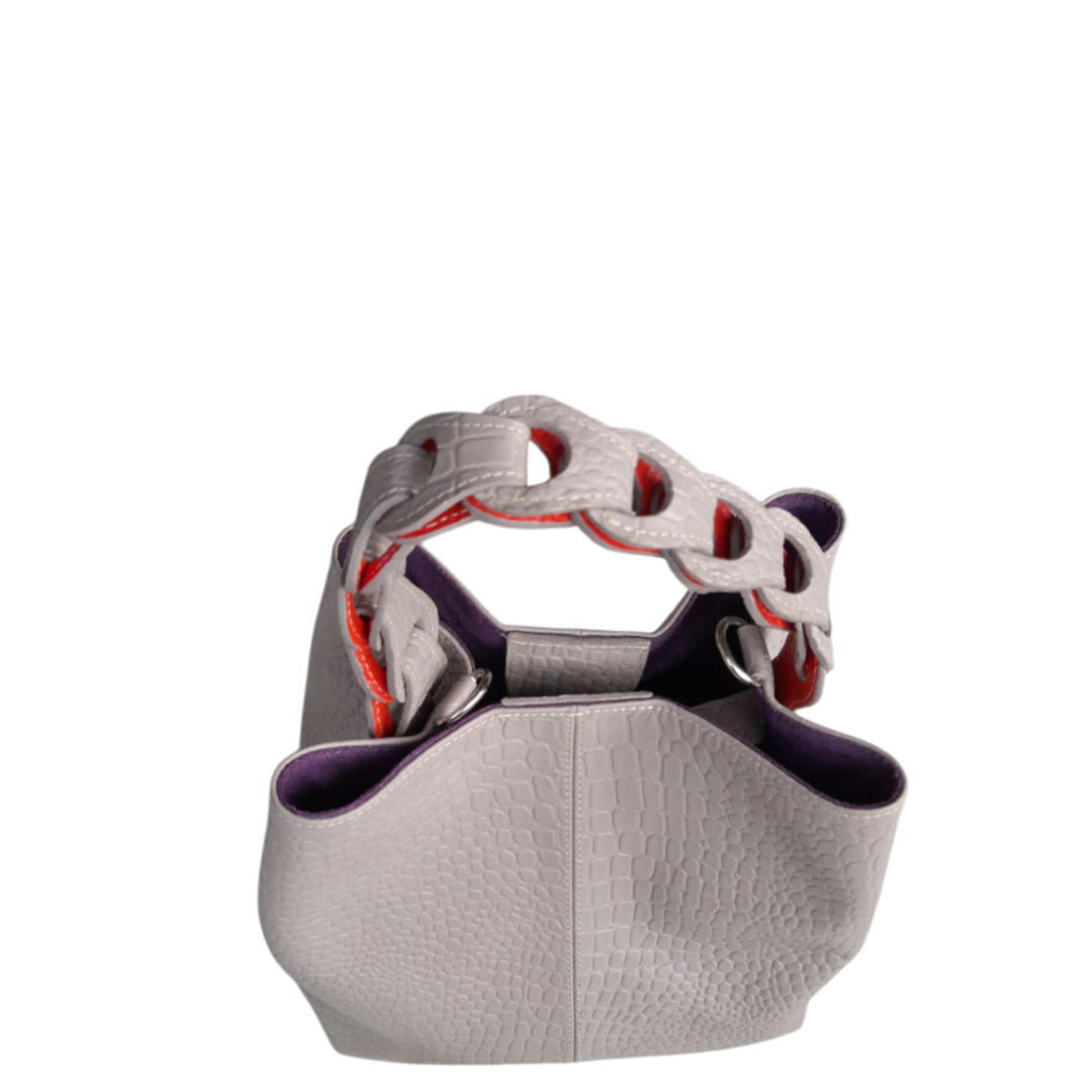 Bolso de mano de cuero Simona Kleine para damas en diseño de reptil en taupe