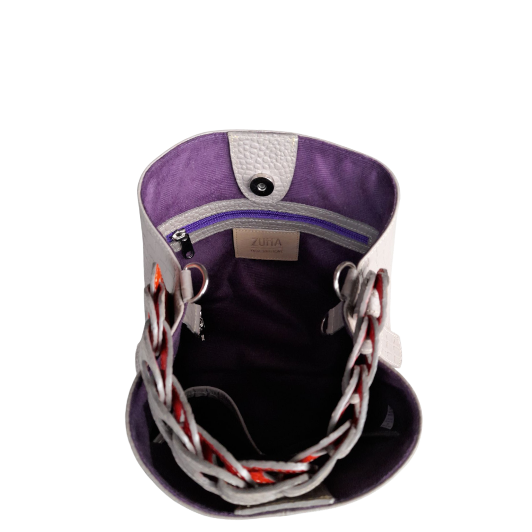 Bolso de mano de cuero Simona Kleine para damas en diseño de reptil en taupe