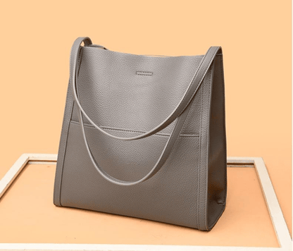 Bolso de hombro liso y unicolor de cuero genuino