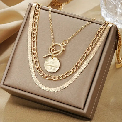 Collar de capas con monedas texturizadas Savira | Oro