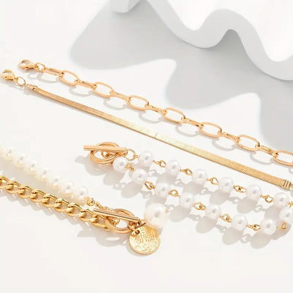 Juego de 4 pulseras Chic Gold – Serpiente, perlas y eslabones | Oro