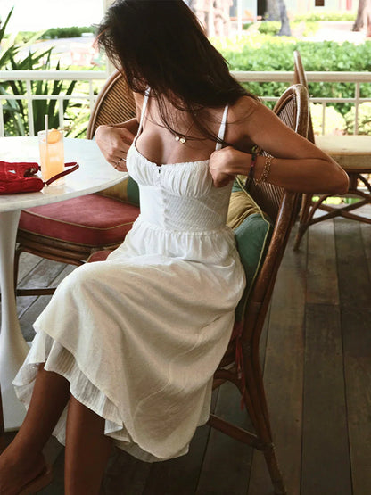 Iris |Vestido midi liso con tirantes y volante en el bajo