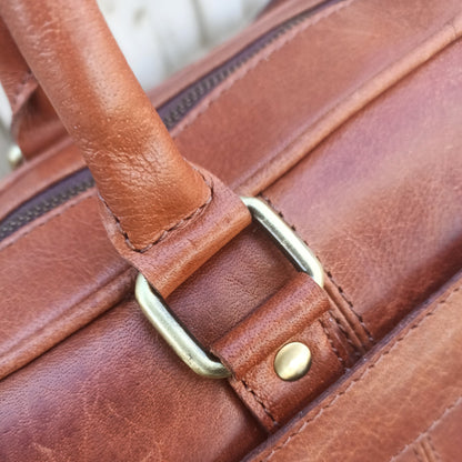 Bolso de cuero marrón para ordenador