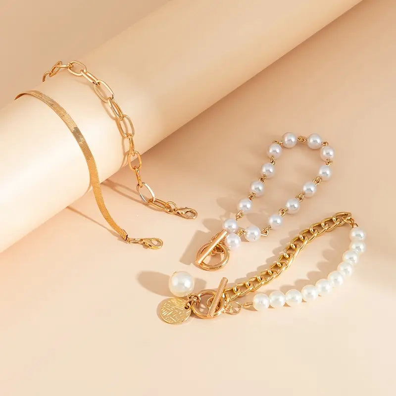 Juego de 4 pulseras Chic Gold – Serpiente, perlas y eslabones | Oro