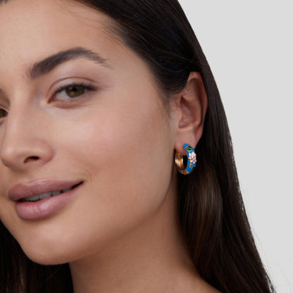 Pendientes de aro dorado con flor